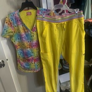 Vibrant Smiley Face Top and Yellow Pants Scrub Set